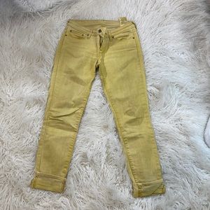 Levi’s mustard yellow skinny jeans
